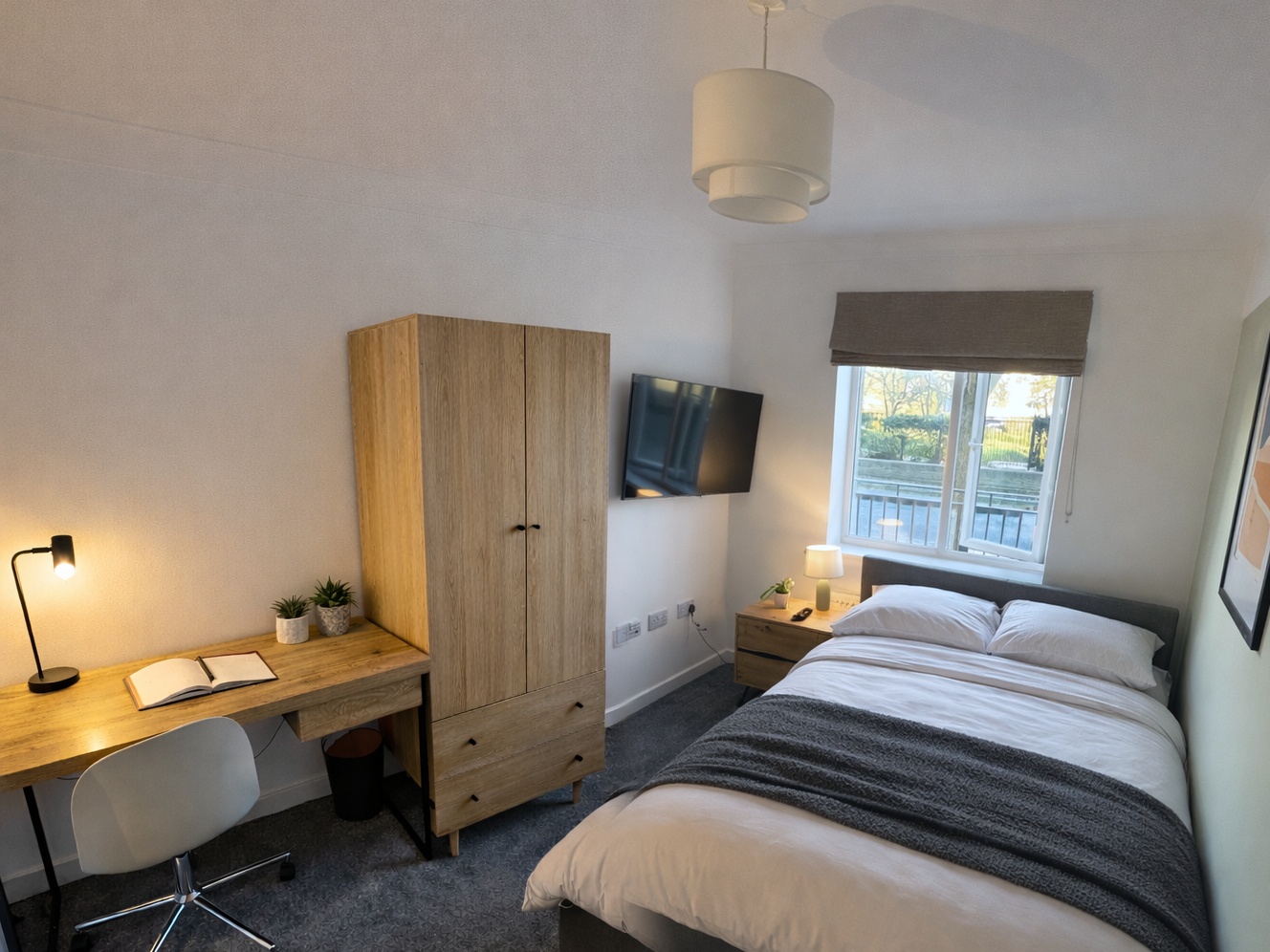 Room 1, bed, desk and wardrobe